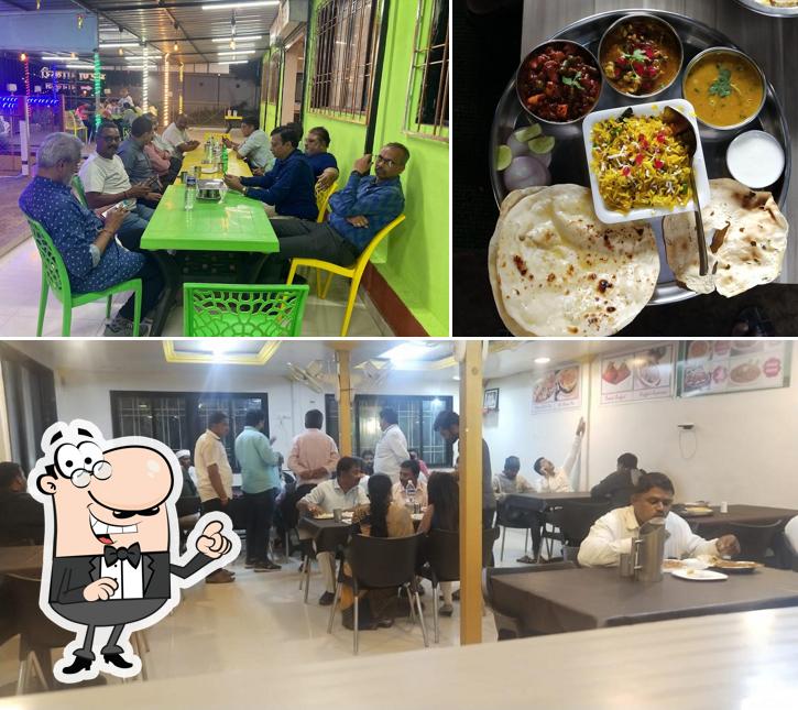 This is the picture showing interior and dessert at Hotel Laxmi Pure Veg