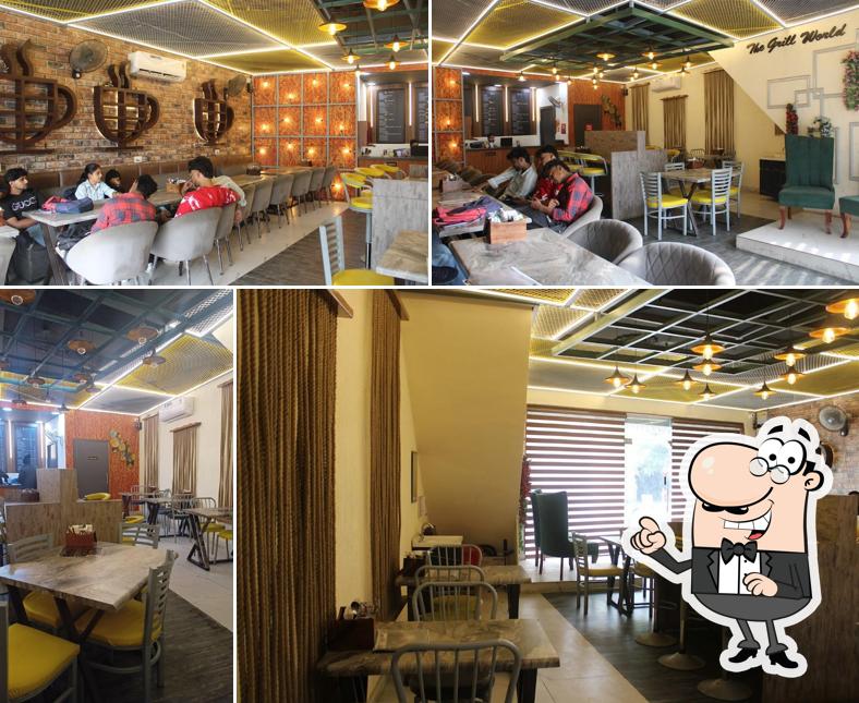 Take a seat at one of the tables at The Grill World