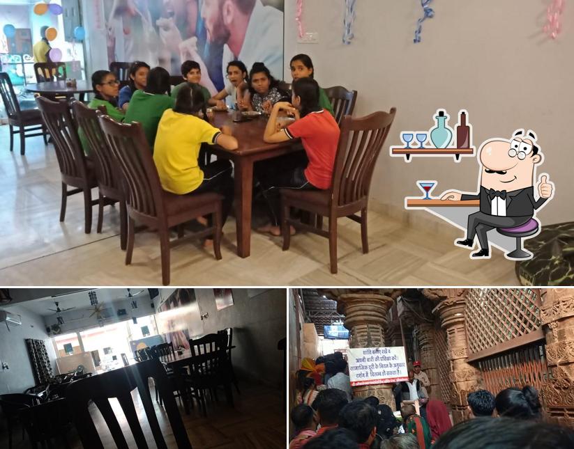 Take a look at the image showing interior and exterior at Pizza Pride