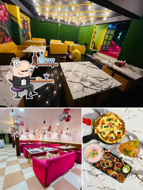 The photo of interior and food at Crown The Family Restaurant