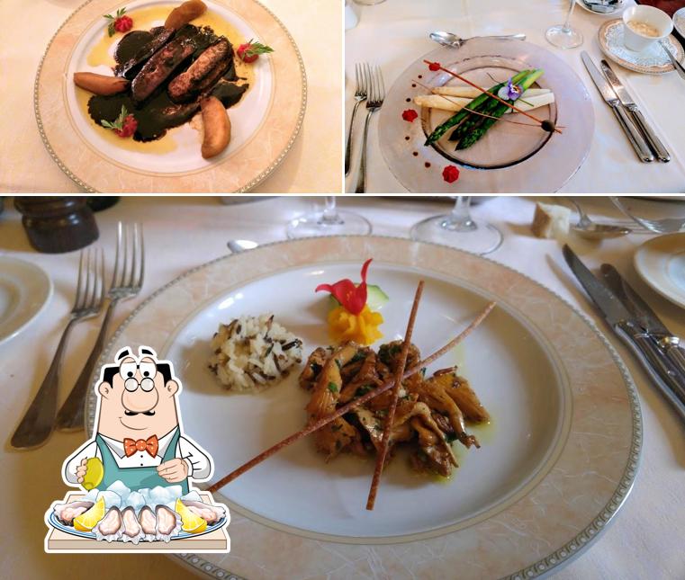 Prenditi la cucina di mare a Auberge Les Platanes