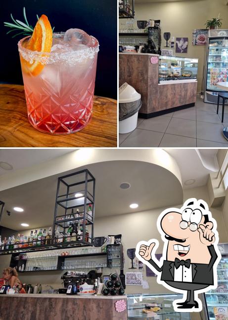 Dai un'occhiata agli interni di Bar Asso Di Cuori