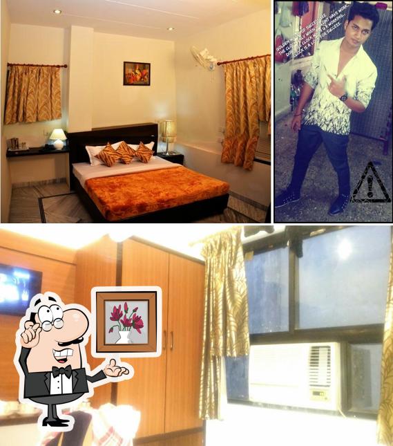 Take a seat at one of the tables at Hotel The Pride