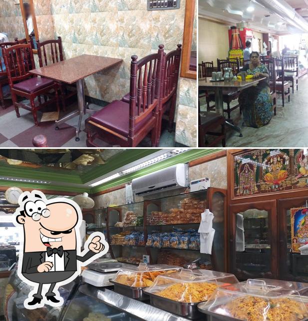 This is the picture showing interior and food at New Bombay Anandha Bhavan