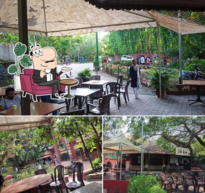Take a seat at one of the tables at Cafe zoom KTDC