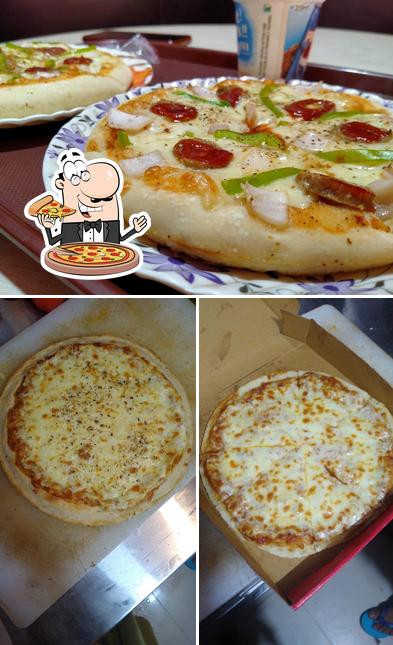 Try out pizza at LAZIZ PIZZA CHAPRA