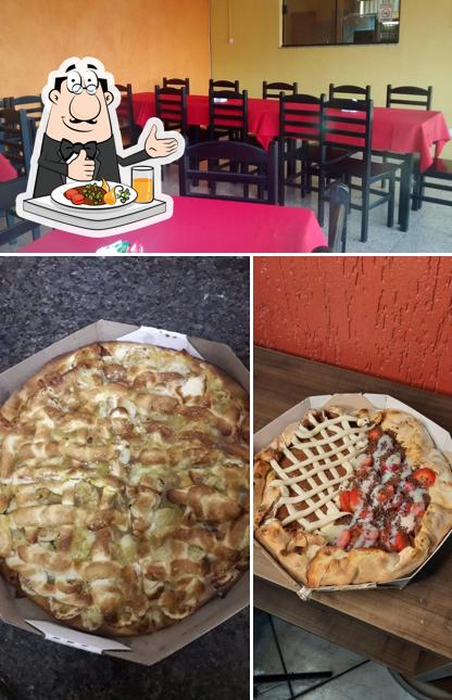 Entre diversos coisas, comida e interior podem ser encontrados no Pizzaria Macarenko