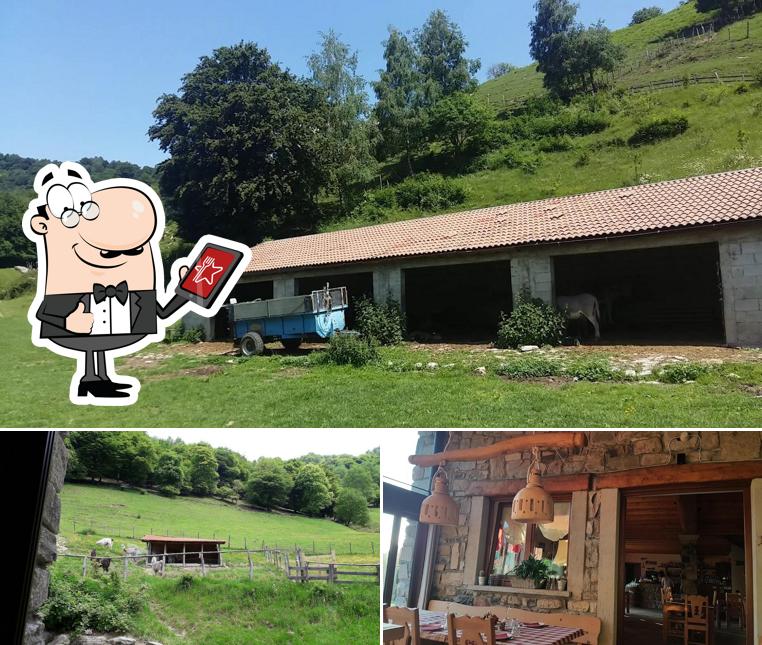 Puoi goderti l'aria fresca da seduto all'esterno di Le Radici Agriturismo