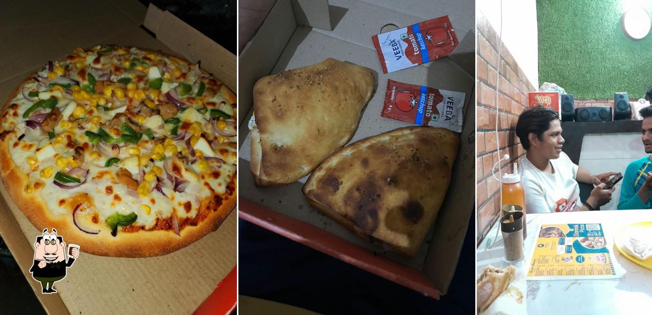 Enjoy a beverage at Domnik Pizza Ganaur