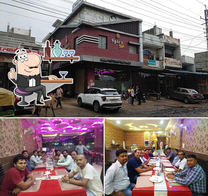 Check out the image depicting interior and exterior at Spicy Treat restaurant