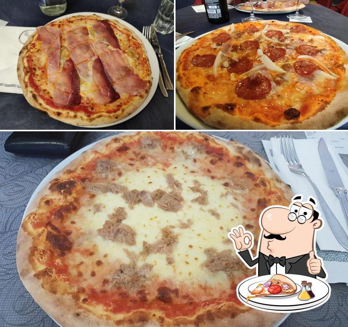 Prenditi una pizza a Ristorante Pizzeria Ristorante Indiano Tartufo