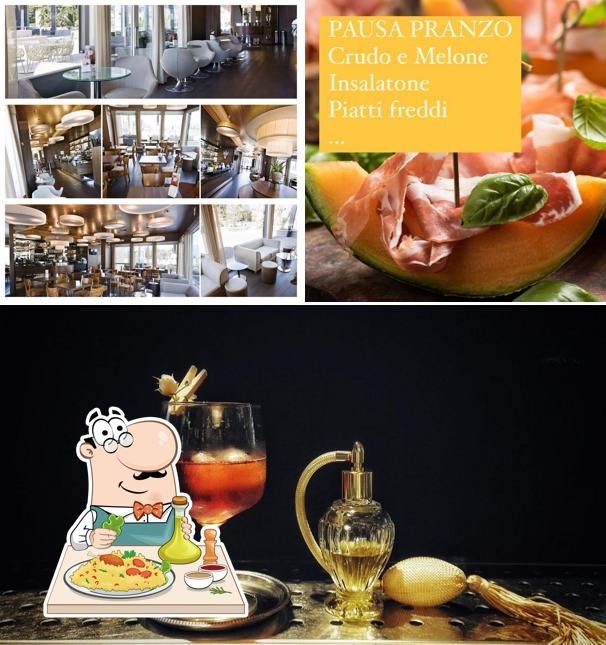 Questa è la foto che mostra la cibo e tavolo da pranzo di Ducoli Café