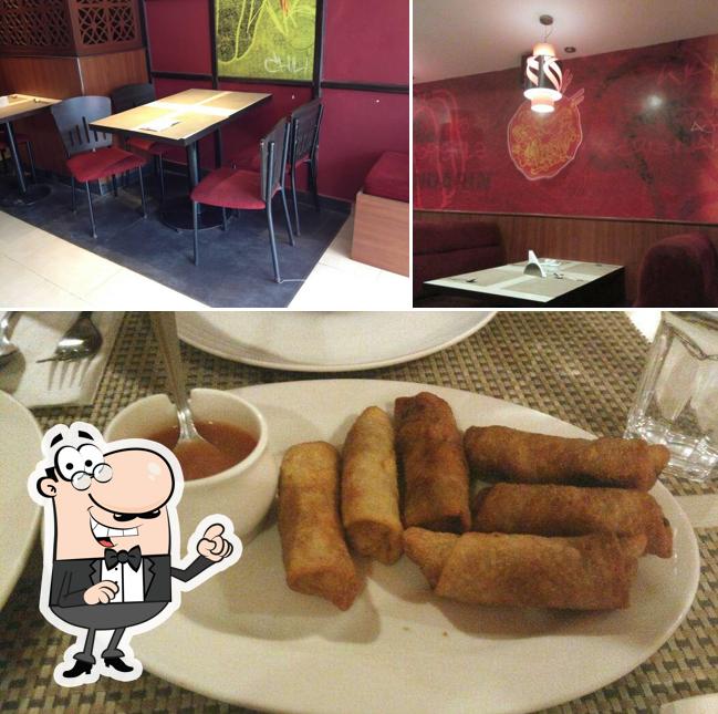 Among different things one can find interior and food at Wangs Kitchen