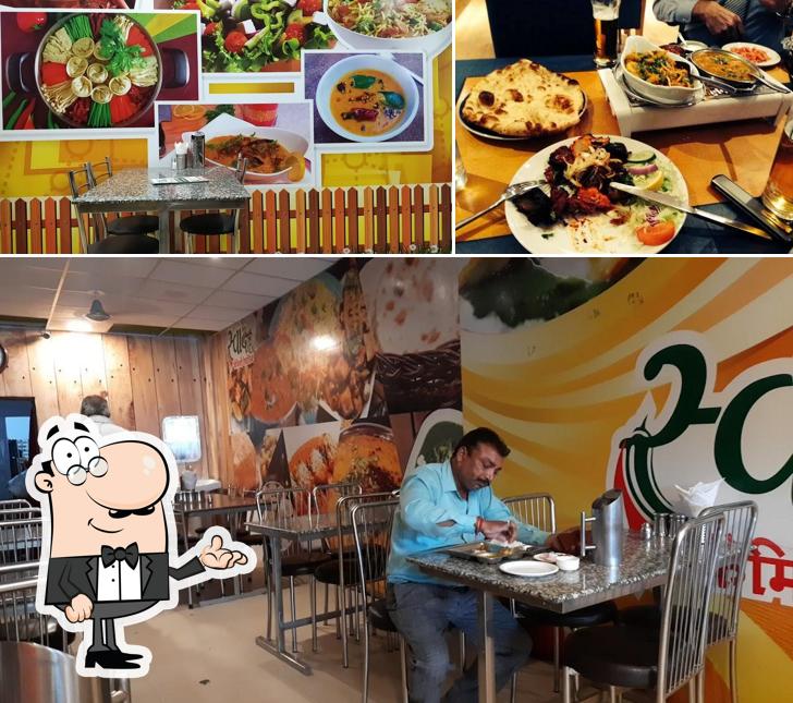 This is the photo depicting interior and food at Swad Family Restaurant