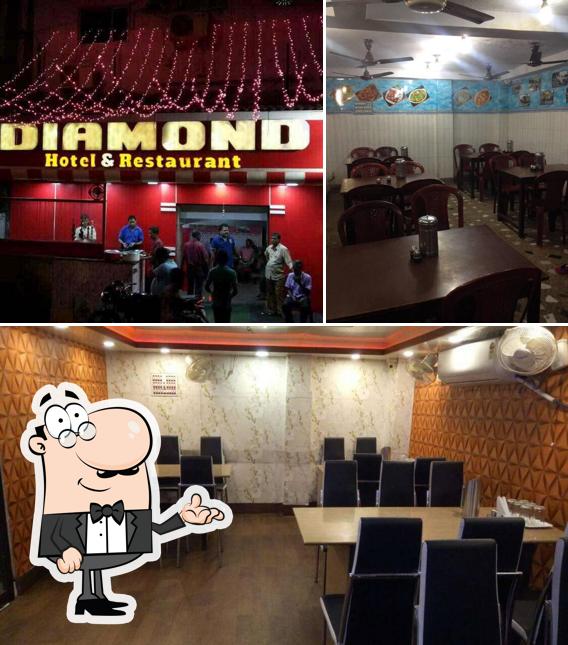 Take a seat at one of the tables at Diamond Hotel & Restaurant