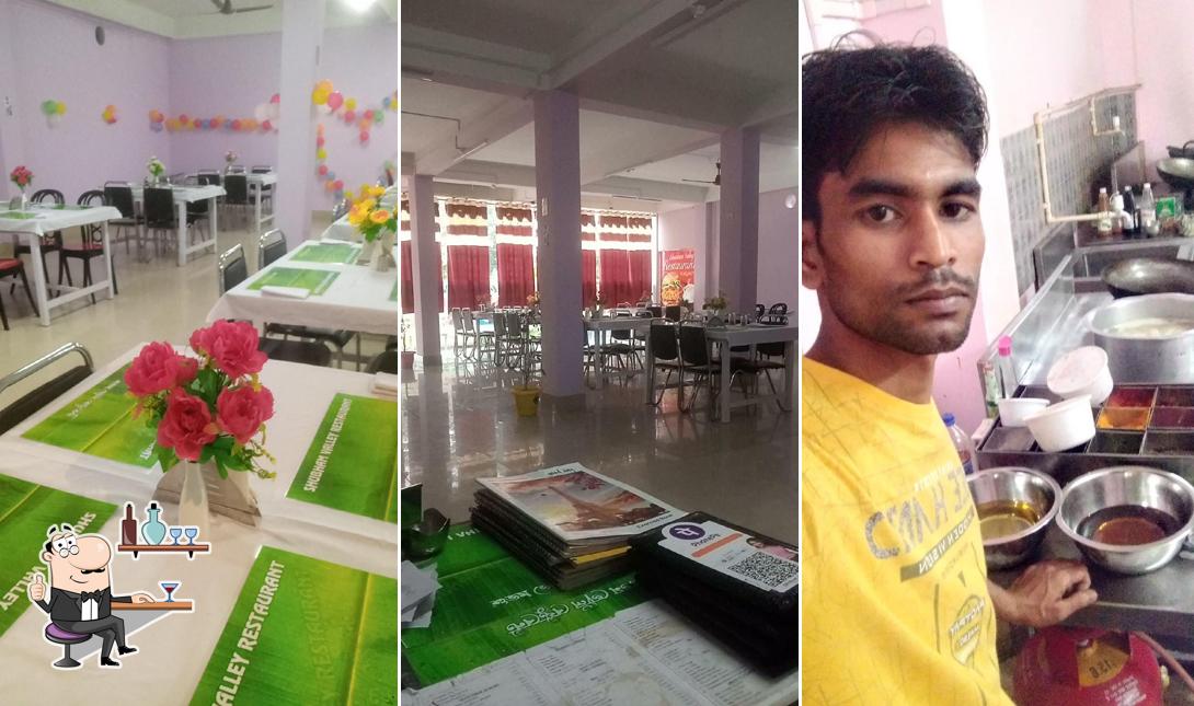 Take a seat at one of the tables at Shubham Valley Restaurant