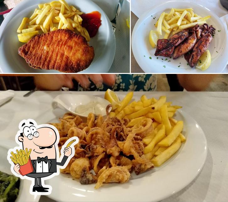 Assaggia un piatto di patatine a Restaurant Adria