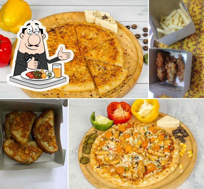 Food at Cheezy Pizza's & Burgers