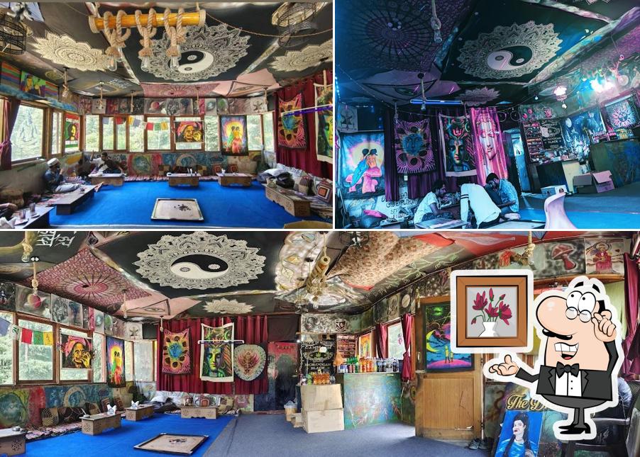 Take a seat at one of the tables at Mushroom Cafe