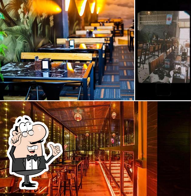 Take a seat at one of the tables at Skygarden Bar & Kitchen koramangala