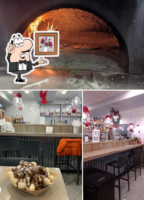 Guarda la foto che presenta la interni e cibo di Terra Mia Pizzeria Sestri Ponente