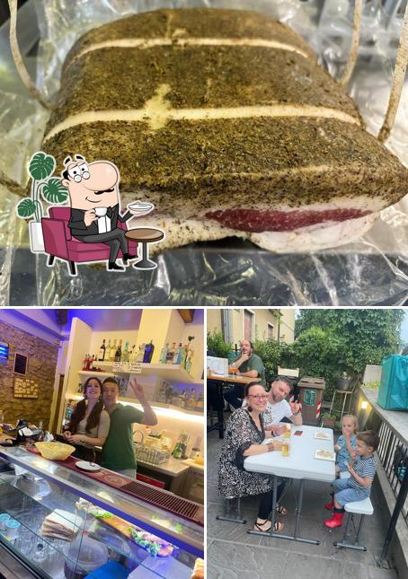 Questa è la foto che raffigura la interni e cibo di Bar Poiano 28 Bar Alba S.A.S