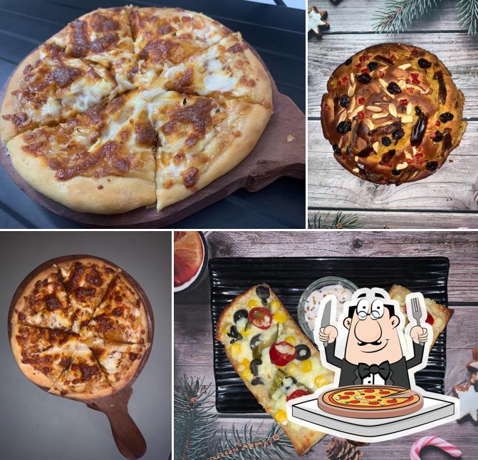 Pick pizza at Uncle Kitchen & Cafe - Restaurant and Cafe