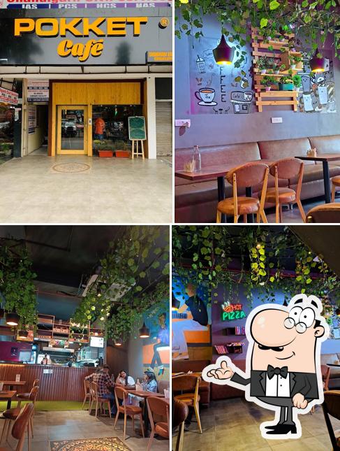 Take a seat at one of the tables at Pokket Cafe Chandigarh