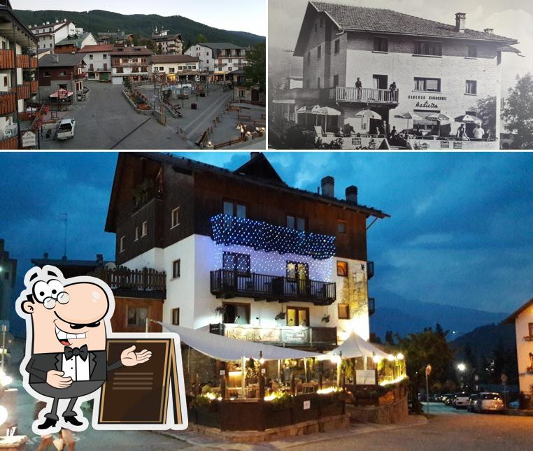 Puoi goderti l'aria fresca da seduto all'esterno di Hotel Assietta