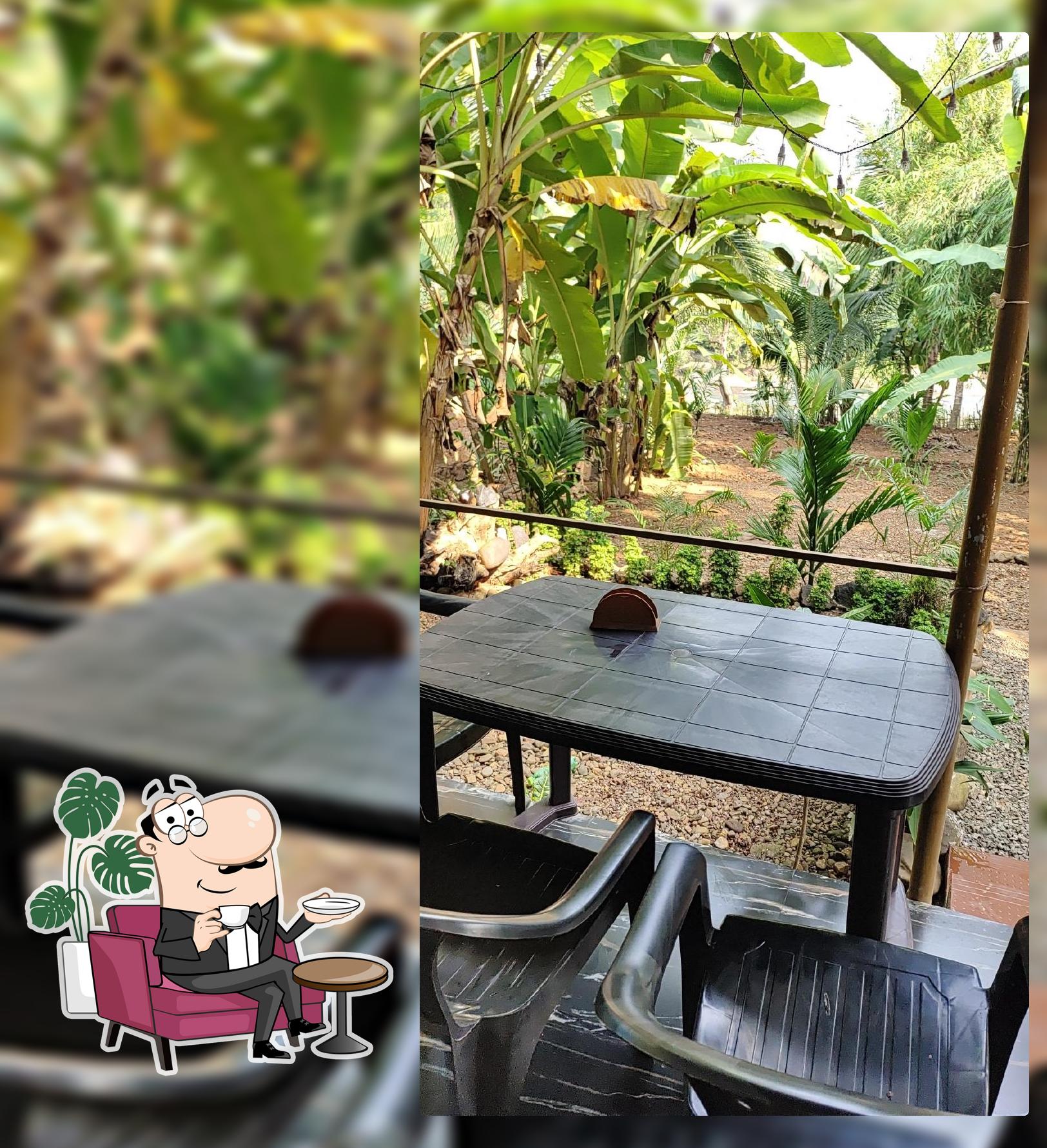 Take a seat at one of the tables at The River bar s restaurant