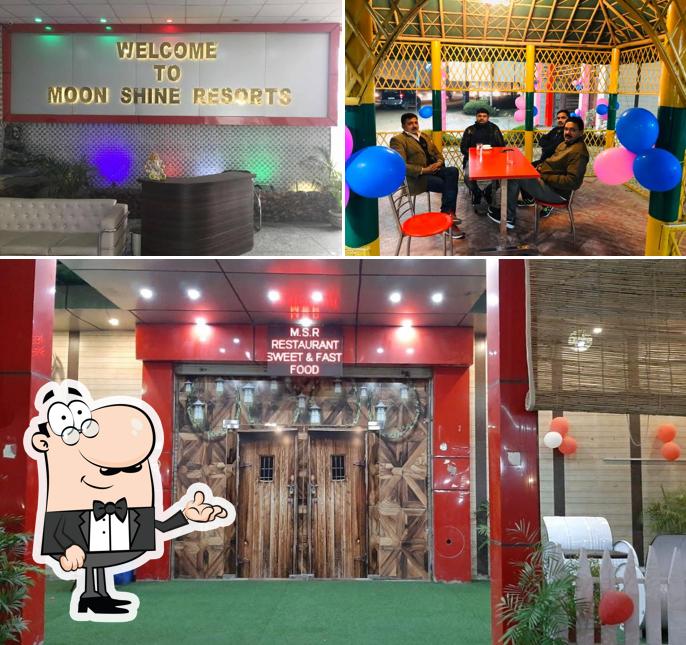 Take a seat at one of the tables at New Moon Shine Resort & Restaurant