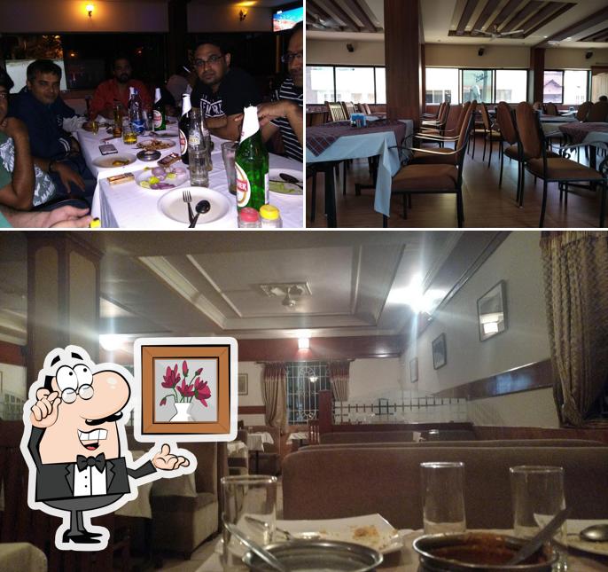 The photo of Ujwal Family Bar And Restaurant’s interior and bar counter