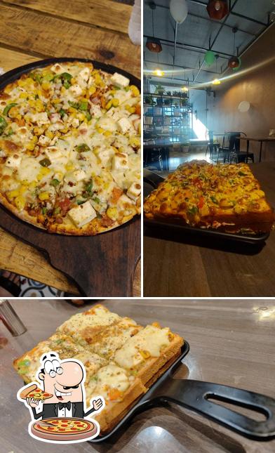 Get pizza at The Delicious Mystery