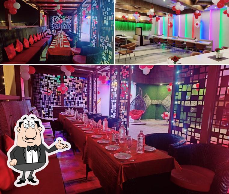 Take a seat at one of the tables at HOTEL V SQUARE