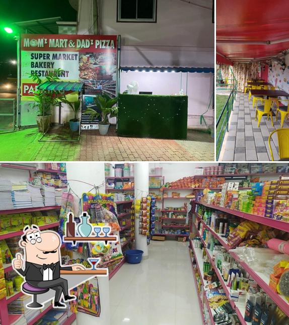 The photo of interior and food at Momz Mart & Dadz Pizza