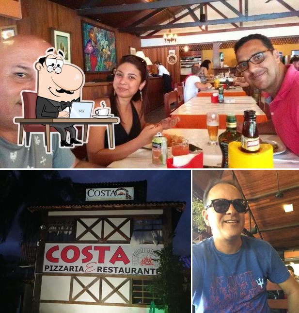 O interior do Costa Pizzaria e Restaurante