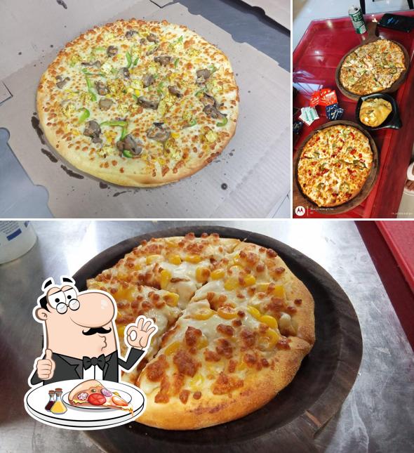 Get pizza at Roms Pizza & Cafe rdc rajnagar