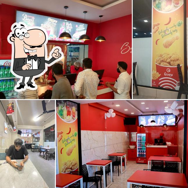 Take a seat at one of the tables at Fryzy fried chicken