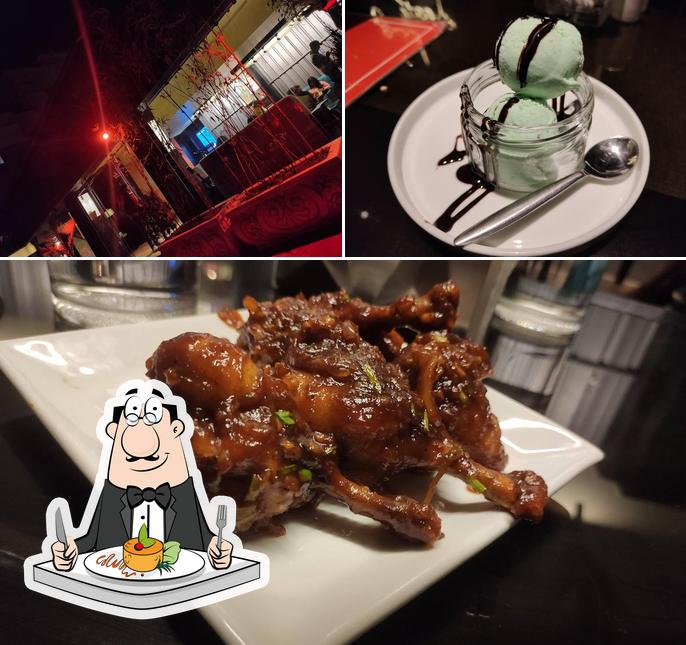 Check out the image showing food and exterior at Grand Gossip