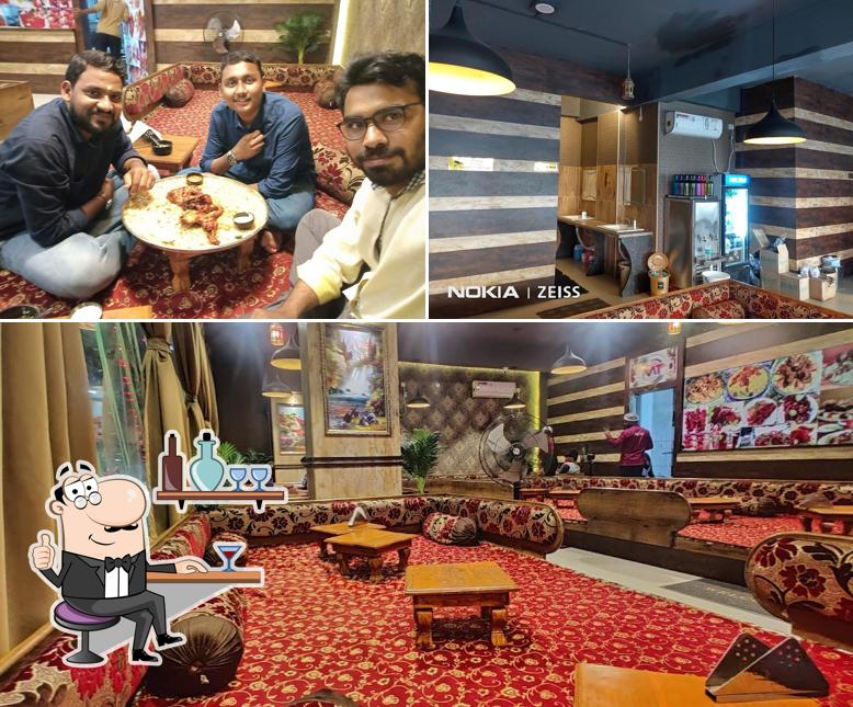 Take a seat at one of the tables at Mandi Town Khairatabad
