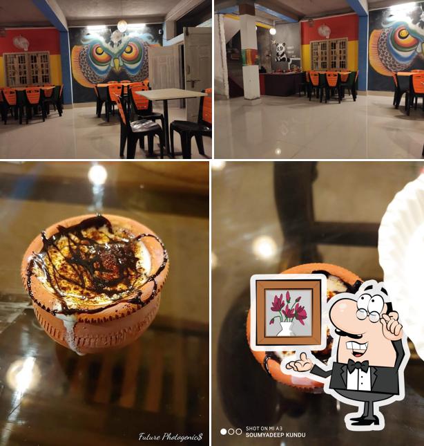 Check out the photo displaying interior and drink at Creative Coffee Corner