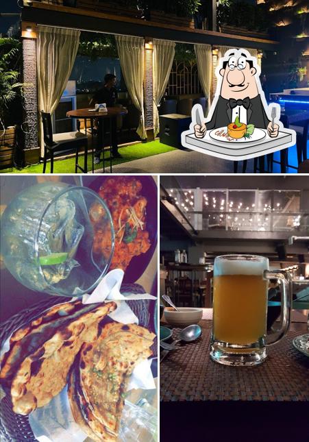 Take a look at the photo displaying food and interior at Penthouse Ludhiana