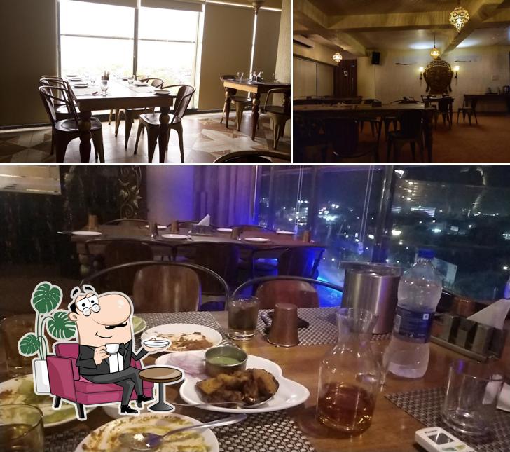 Take a seat at one of the tables at Sevva By Tankra's