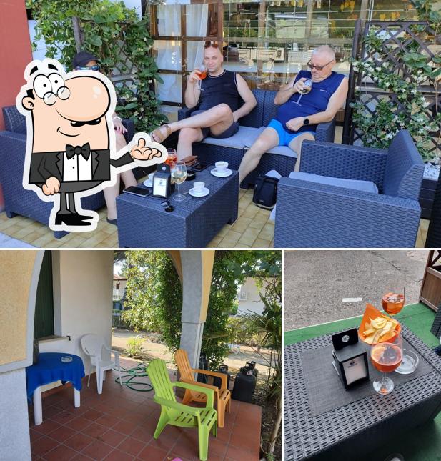 La immagine di interni e cibo da Osteria