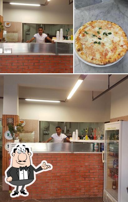 Dai un'occhiata agli interni di Pizza Go