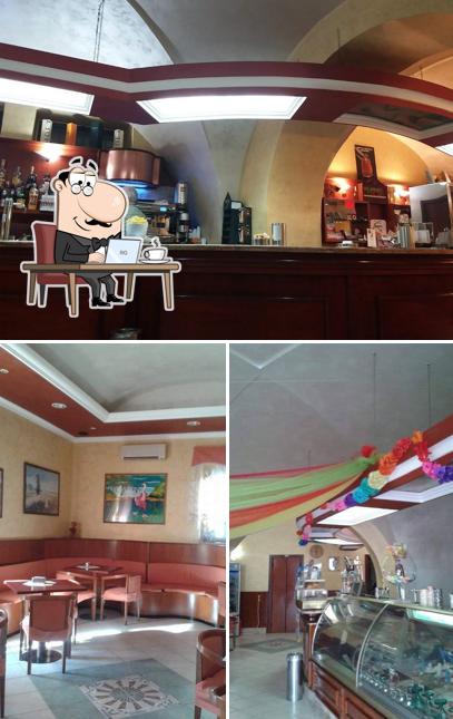 La foto della interni e bancone da bar di Charly Bar