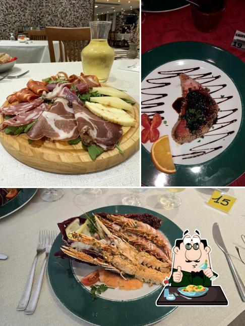 Tra le varie cose da Ristorante Pizzeria Le Arcate si possono trovare la cibo e bevanda