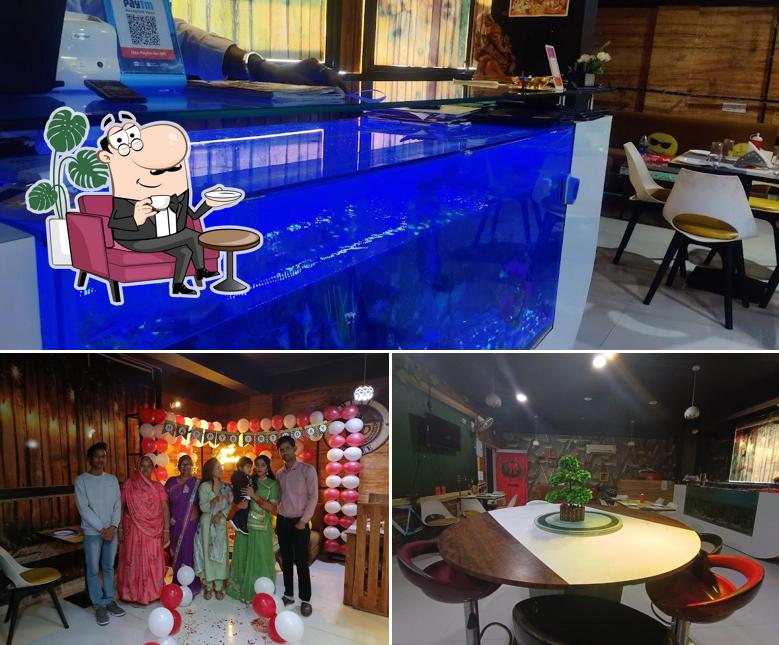 Take a seat at one of the tables at Baltaaz Cafe and Restro