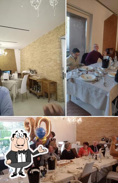Guarda la foto che presenta la interni e tavolo da pranzo di Ristorante Belvedere