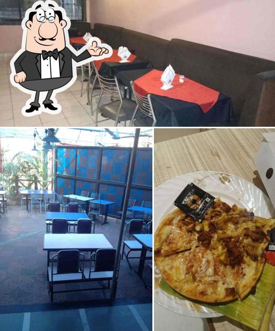 This is the image displaying interior and food at Disha's Pizza Inn